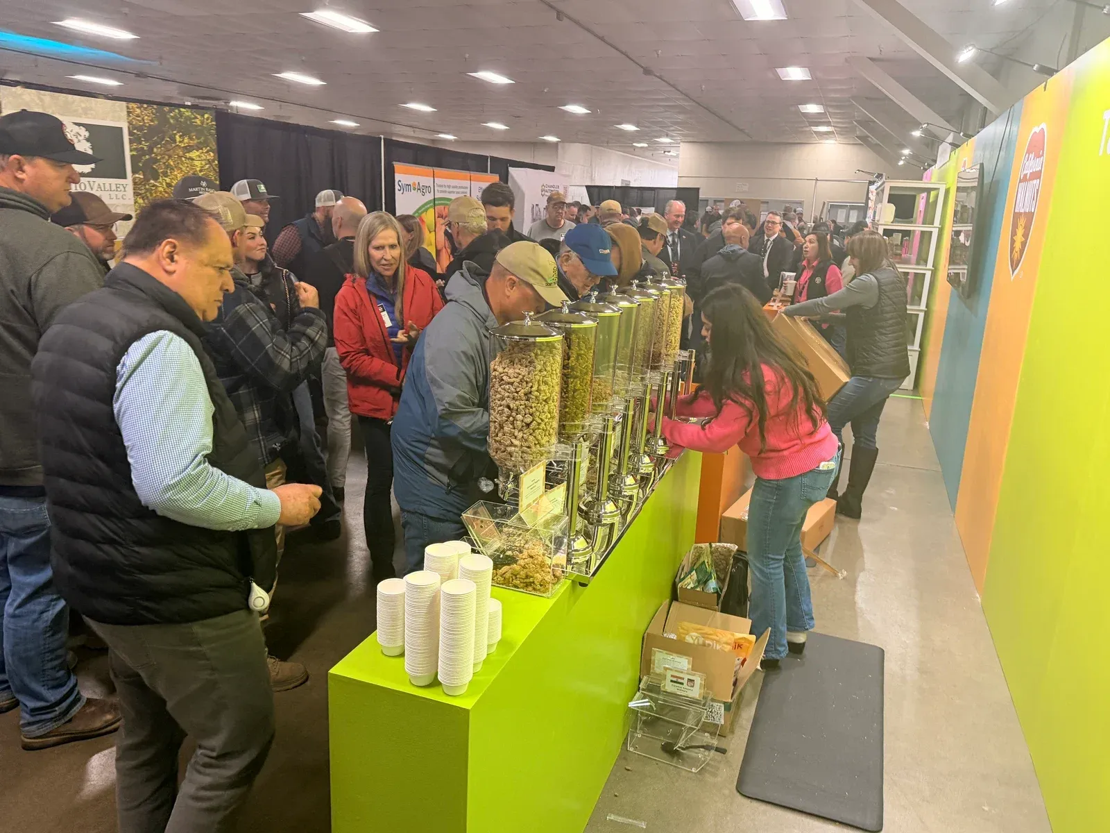 Growers and industry partners gather at the walnut tasting bar during California Walnut Conference.