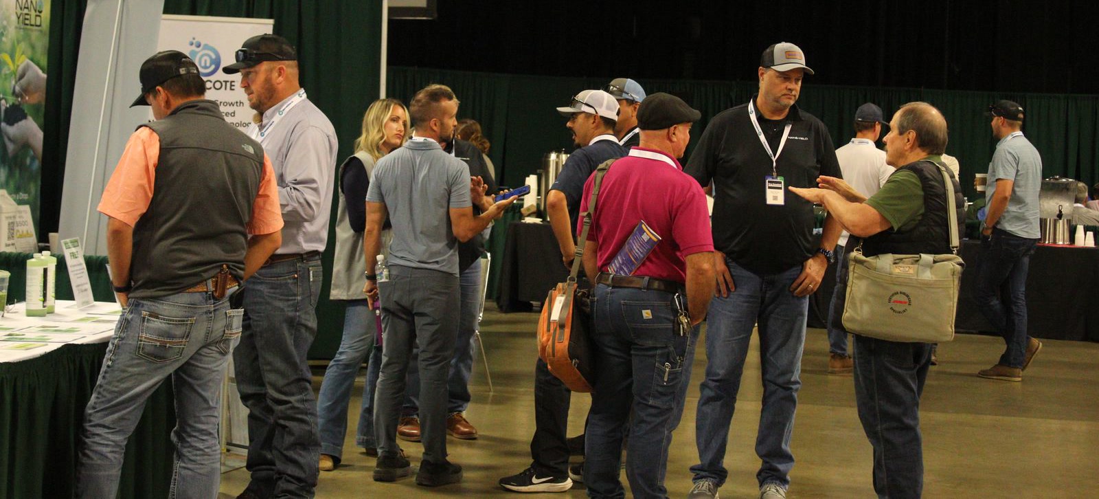 Attendees networking on the Crop Consultant Conference trade-show floor
